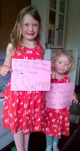 example photo of children holding sign